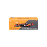 Bburago McLaren MCL38 ´24, mit Helm Modellauto im Showcase 1:24