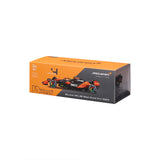 Bburago McLaren MCL38 ´24, mit Helm Modellauto im Showcase 1:24